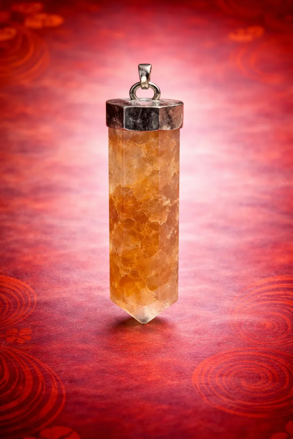 Colgante pequeño de hematoide en baño de plata