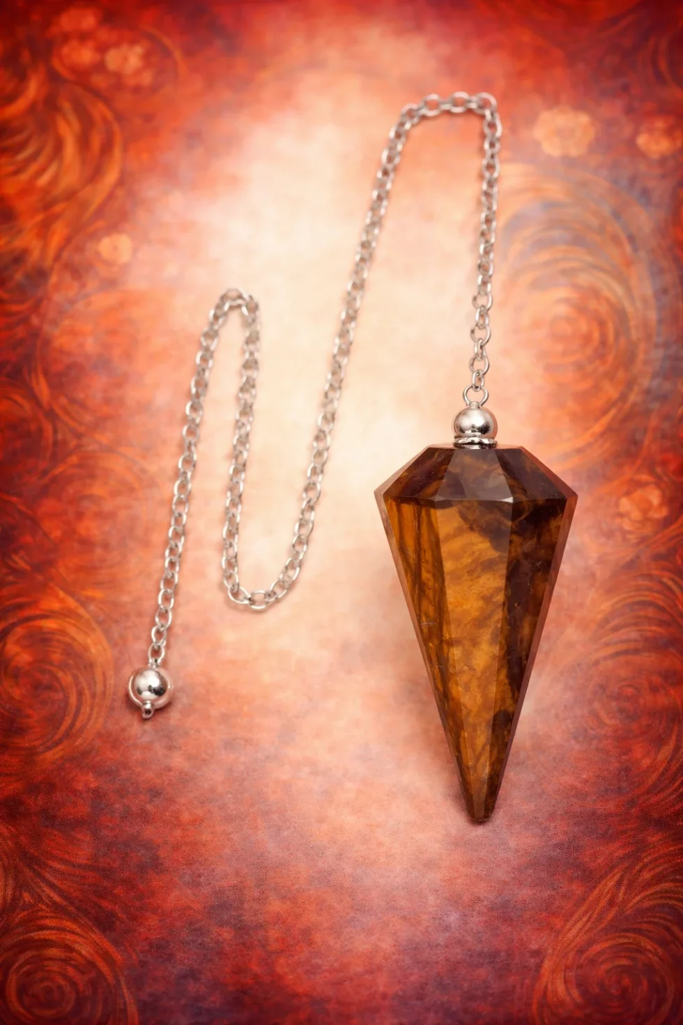 Péndulo facetado de ojo de tigre